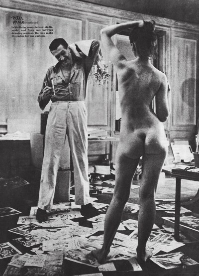 Cartoonist Peter Arno with model