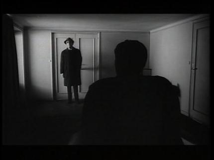 The Trial - man blocking door