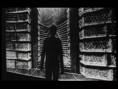 The Trial - man blocking prison door