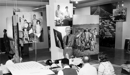 Steichen in 1955 assembling an exhibition of photos for New York's Museum of Modern Art.