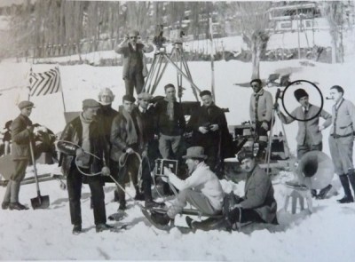 Crew filming the snowball fight. Note the camera mounted on a sled. Gance is circled.