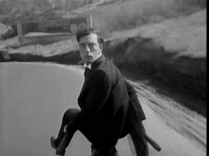 Keaton. Sherlock Jr. Bike sit back.